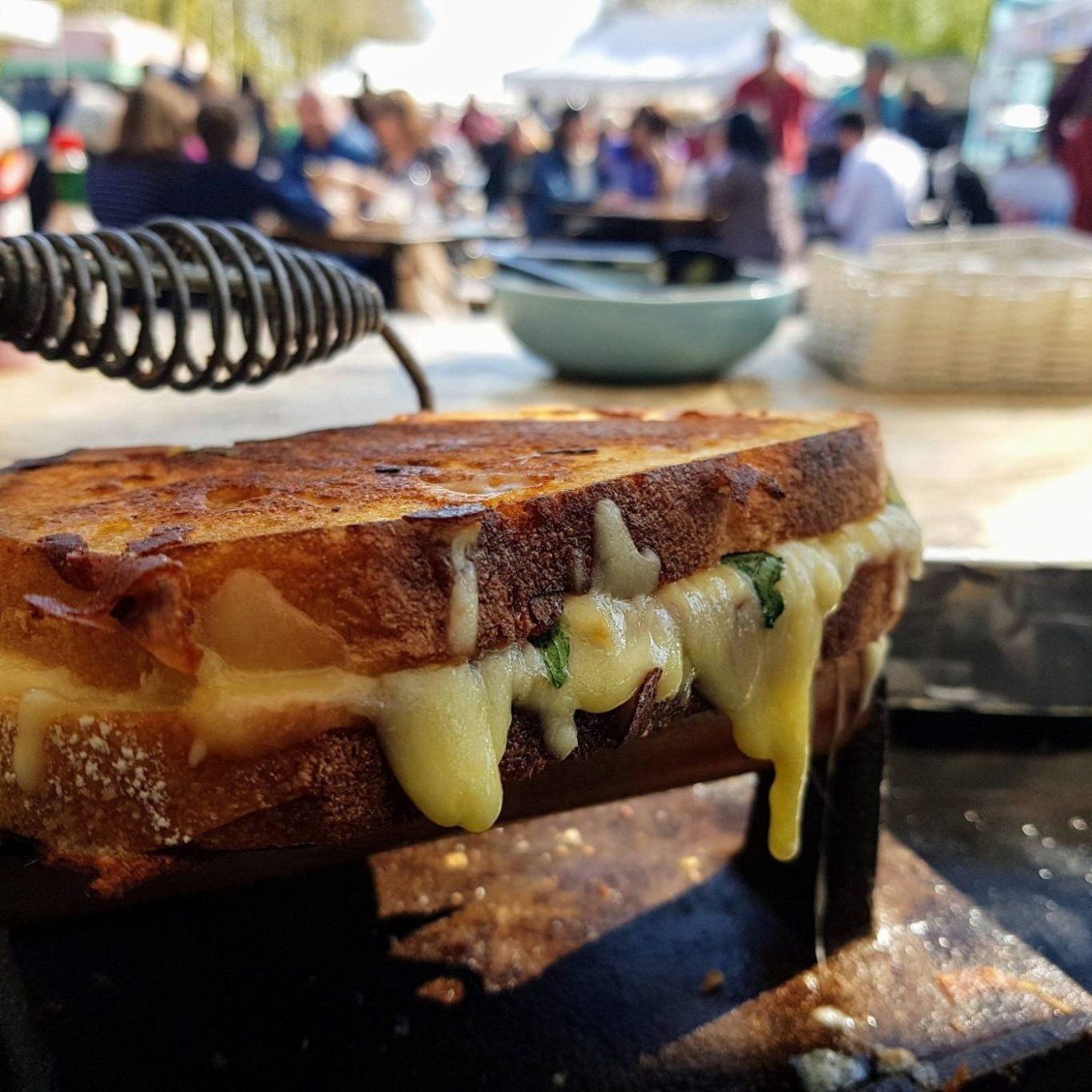 A freshly grilled Press & Melt cheese toastie on the hotplate